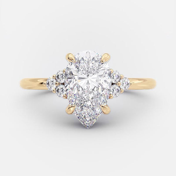 Clarissa – Anillo de diamante con corte de gota en acabado dorado.