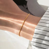 Carina – Pulsera de oro con estructura de platino brillante.