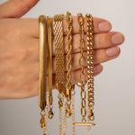 Tereza – Pulsera dorada con efecto de cadena doble.