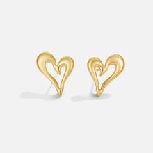 Amira – Pendientes en forma de corazón color dorado.