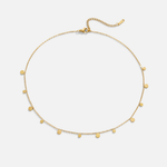 Elisa – Collar dorado con diseño de filigrana.
