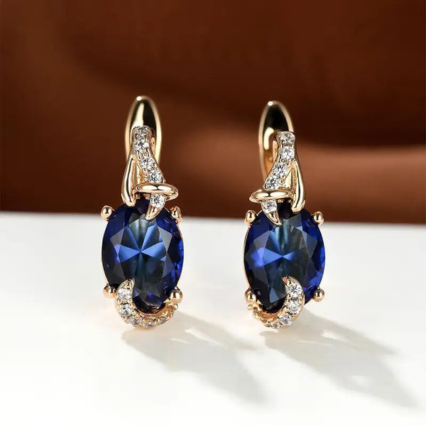 Elina – Pendientes con brillo de zafiro oscuro.