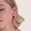 Anneliese – Pendientes dorados en forma de concha.