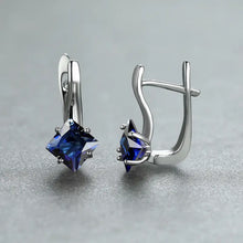 Lívia – Pendientes colgantes con zafiro facetado.