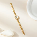 Isabella – Reloj dorado con pulsera de eslabones redonda.