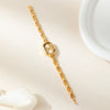 Viktoria – Reloj dorado con caja ovalada.