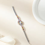 Amelie – Reloj dorado con marco de cristal.