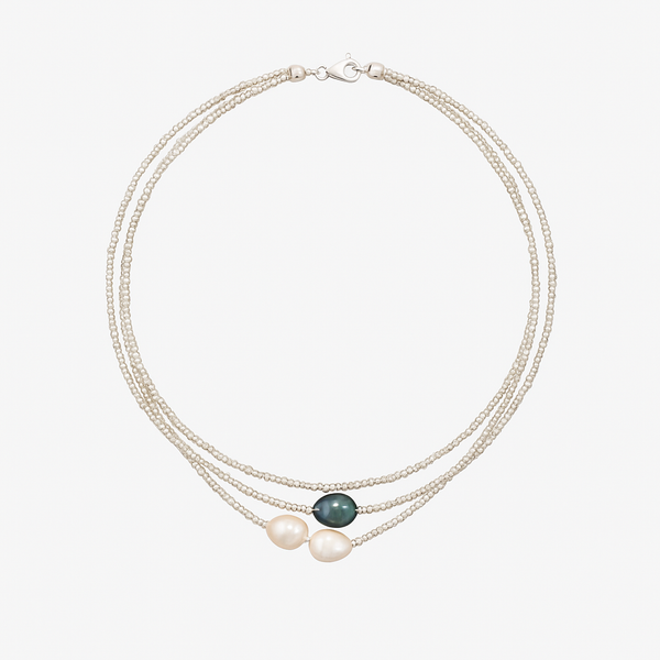 Helene – A delicate multi-strand pearl necklace with harmonious natural tones.