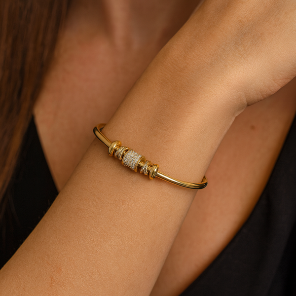 Nina - Pulsera ajustable con charms de oro