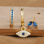 Leandra – Pendientes dorados con forma refinada.
