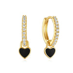 Theresia – Pendientes dorados con suave curvatura.