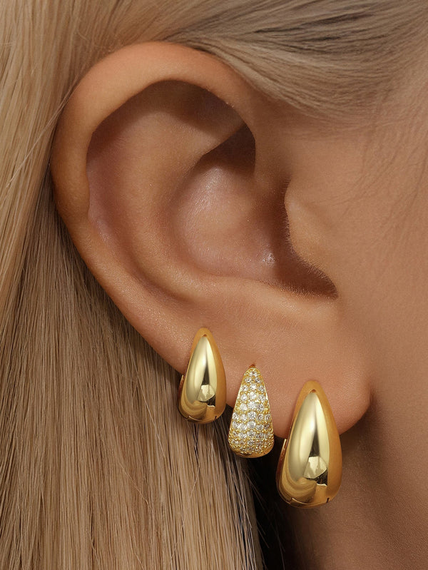Rosalie – Pendientes dorados suaves con estructura curva.