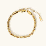 Lena – Pulsera dorada con delicada estructura de cordón