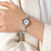 Elina – Reloj dorado con pulsera de inspiración floral.