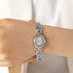 Clara – Reloj dorado con esfera alargada.