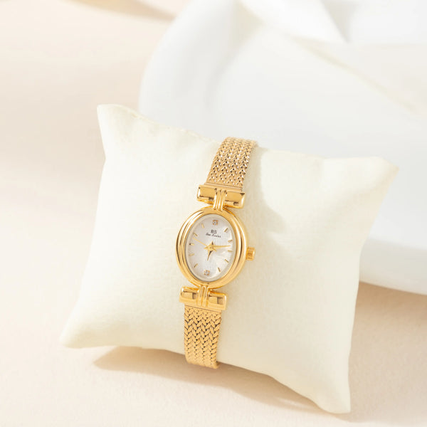 Selina – Reloj dorado con diseño ovalado.