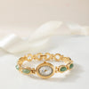 Clara – Reloj dorado con esfera alargada.