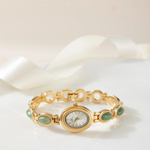 Clara – Reloj dorado con esfera alargada.