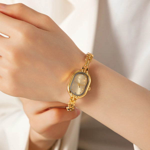 Viktoria – Reloj dorado con caja ovalada.