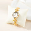 Elina – Reloj dorado con pulsera de inspiración floral.