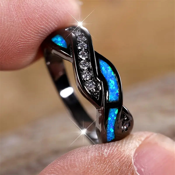 Leonie – Anillo de plata con piedra azul oscuro.