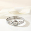 Selina – Reloj dorado con diseño ovalado.