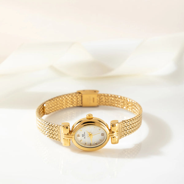 Selina – Reloj dorado con diseño ovalado.