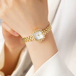 Isabella – Reloj dorado con pulsera de eslabones redonda.