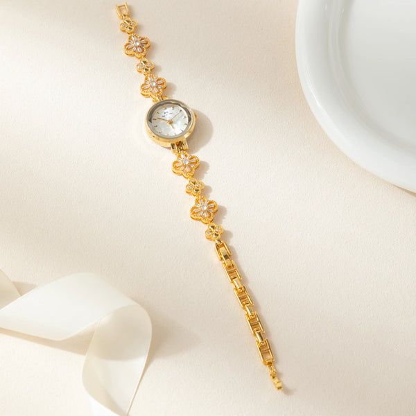 Elina – Reloj dorado con pulsera de inspiración floral.