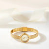 Magdalena – Gold watch with a narrow strap.