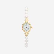 Aurelia – Women's gold watch with a teardrop-shaped dial.