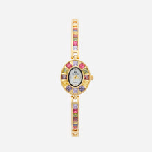 Amelie – Gold clock with glass frame.