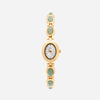 Clara – Reloj dorado con esfera alargada.