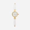 Johanna – Reloj dorado con borde de cristal.
