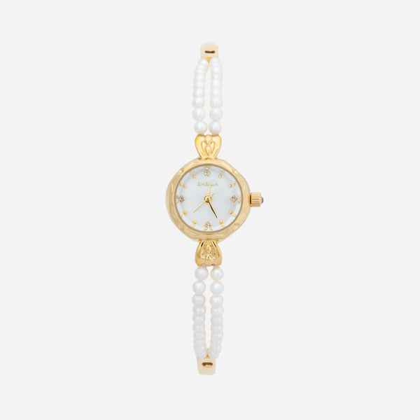 Johanna – Reloj dorado con borde de cristal.