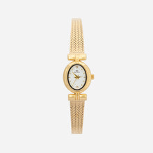 Selina – Gold-tone watch with oval design.