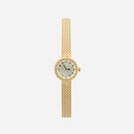 Magdalena – Gold watch with a narrow strap.