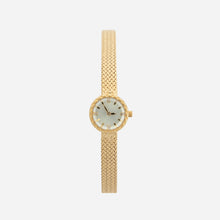 Magdalena – Gold watch with a narrow strap.