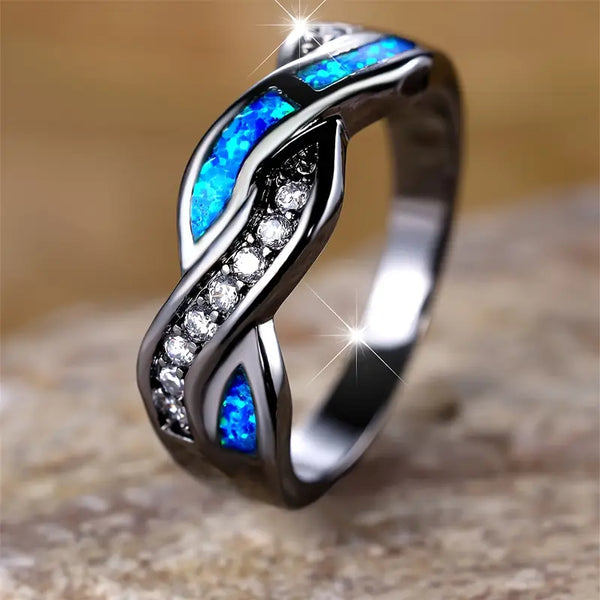 Leonie – Anillo de plata con piedra azul oscuro.