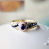 Beatrix – Anillo dorado con doble piedra.