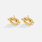 Romana – Pendientes dorados con forma entrelazada.