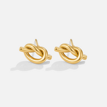 Romana - Gold interlaced hoop earrings.