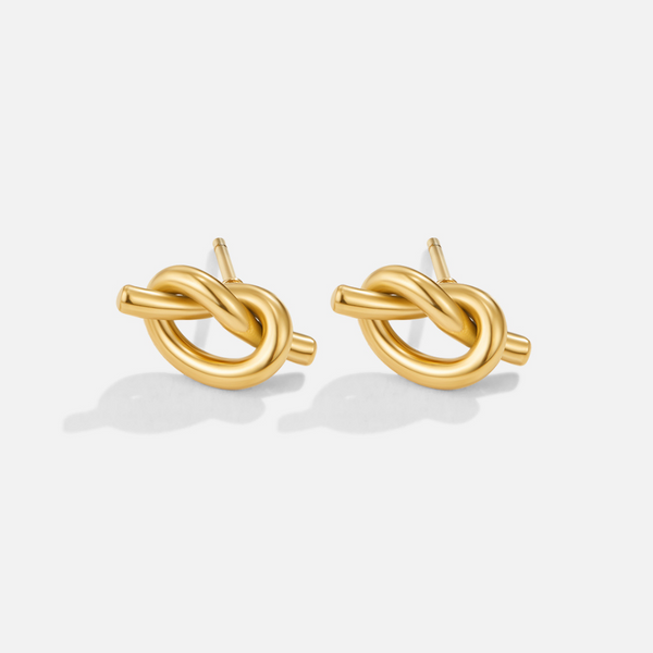 Romana – Pendientes dorados con forma entrelazada.
