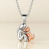 Necklace with hugging cat pendant