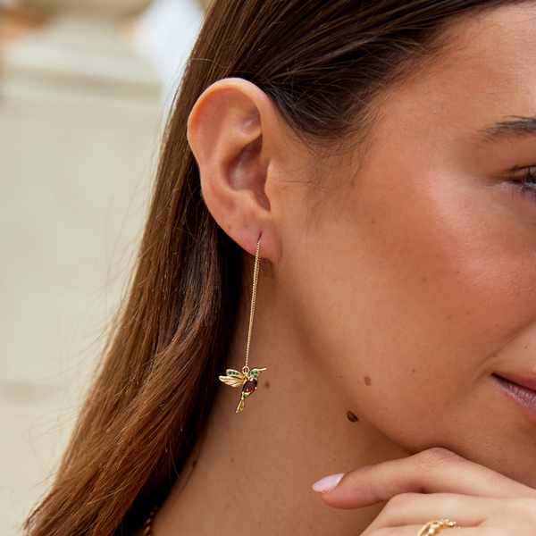 Gold hoops with delicate pendant
