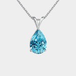 Melina – Collar de plata con colgante azul claro.