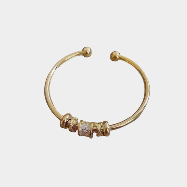 Nina - Pulsera ajustable con charms de oro
