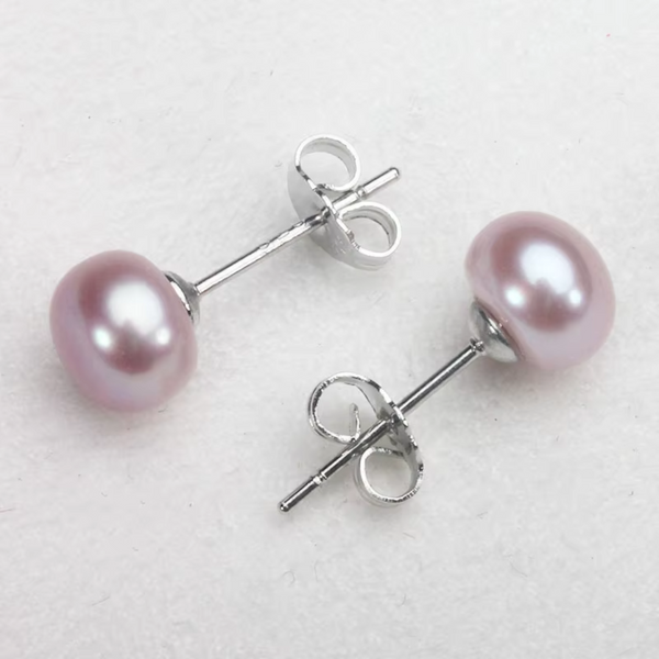 Frieda – Pendientes de oro con perlas y forma clara.