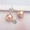Frieda – Pendientes de oro con perlas y forma clara.
