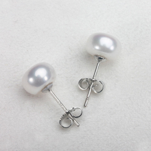 Frieda – Pendientes de oro con perlas y forma clara.